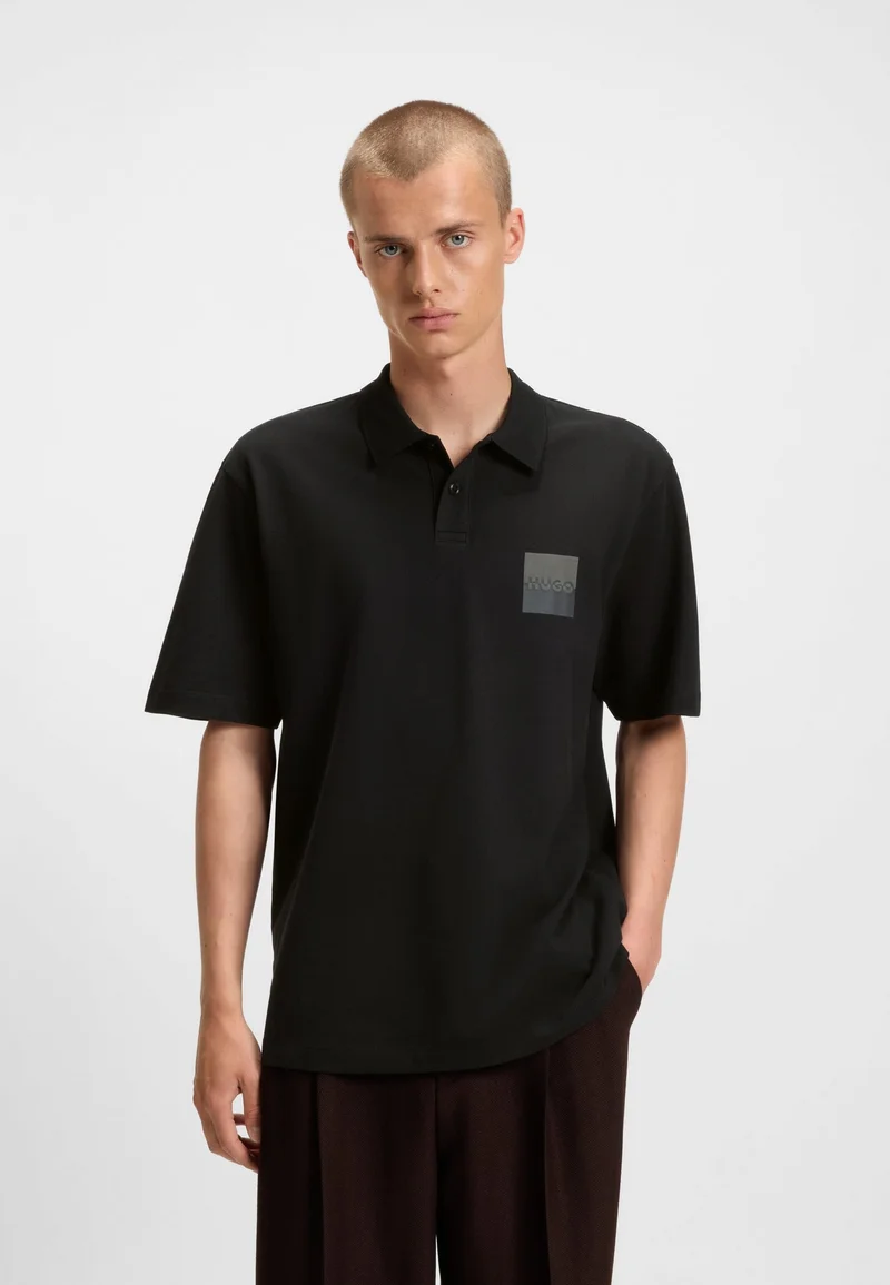 HUGO Relaxed-fit polo shirt in cotton with split logo